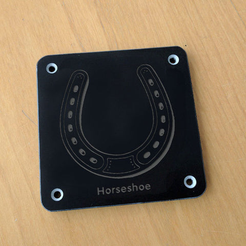'Horseshoe' rubbing plaque