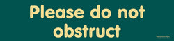 'Please do not obstruct' sign